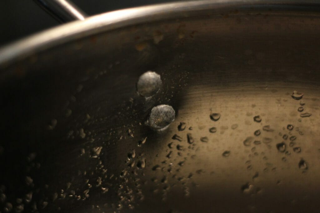 rivets inside a stainless steel pot