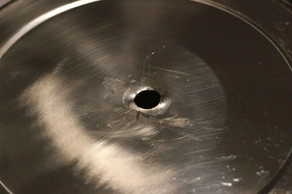 7/16" hole drilled into bottom of a stainless pot
