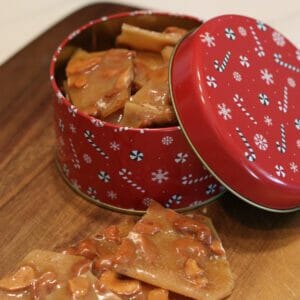 cashew brittle in holiday tin