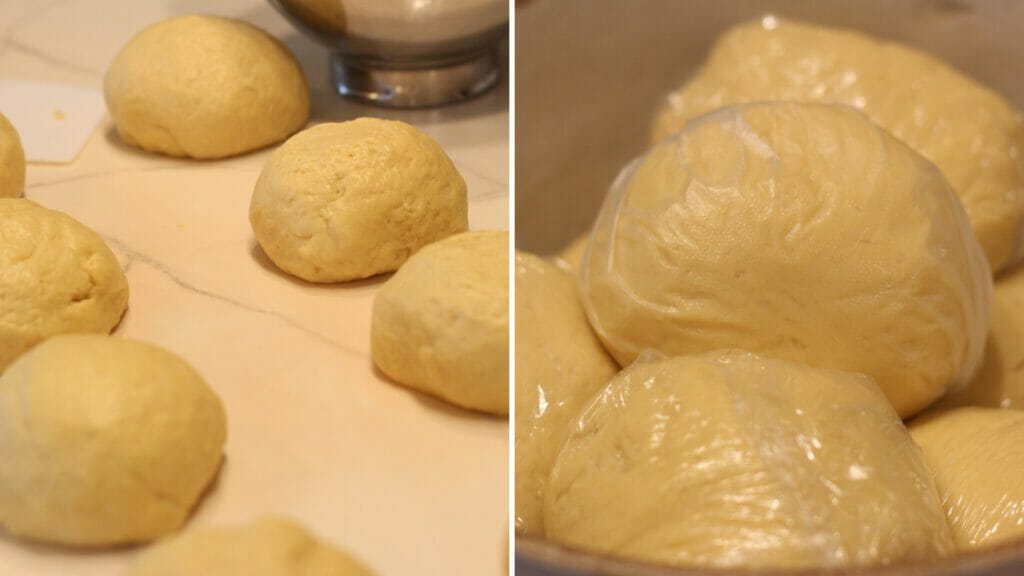 sourdough nut roll dough separated into 8 balls then wrapped in plastic wrap