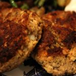 salmon cakes (salmon patties) served on a platter