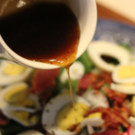 hot bacon dressing poured over spinach salad