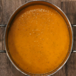 roasted yellow tomato soup in a stock pot