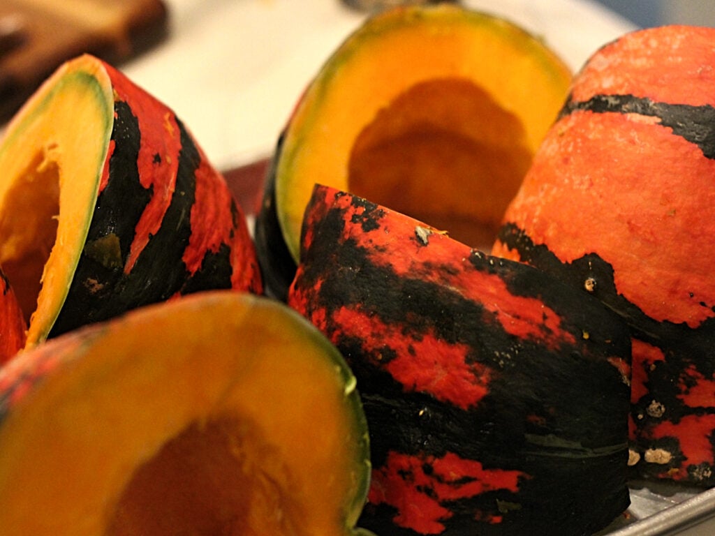 pumpkins  cut on baking sheet