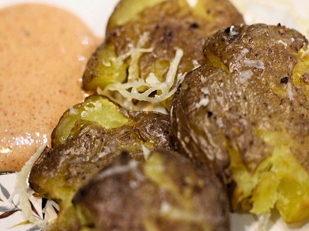 finished crispy smashed potatoes with parm cheese